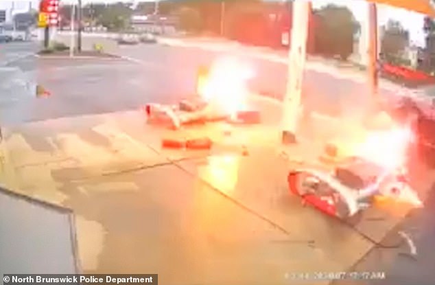 The fuel pumps at the gas station in North Brunswick, New Jersey, burst into flames after two cars crash on Tuesday morning