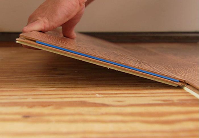 to lay laminate wood on an uneven floor